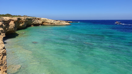 Fototapeta premium Beautiful turquoise rocky seascape in iconic island of Koufonisi, Small Cyclades, Greece