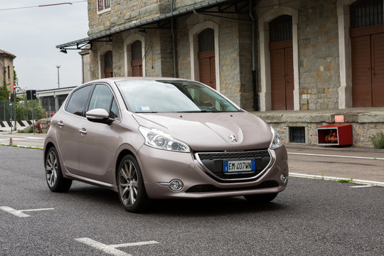 Trieste,Italy APRIL 23,2016:Photo of a Peugeot 208 E-hdi 1.6cc.The Peugeot 208 is a supermini car (B-segment) produced by the French maker and unveiled at the Geneva Motor Show in March 2012.