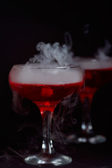 Halloween cocktail Bloody Mary with smoke