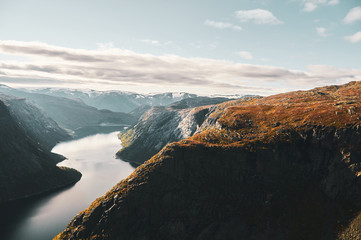 Breathtaking views of Norwegian national park, river and fjords at bright day.