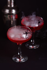 Halloween bloody cocktails with spidera in halloween bloody cocktail with spider
