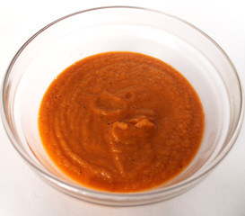 Vegetable eggplant zucchini squash caviar puree in glass bowl isolated on white background