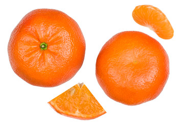 Tangerine and slices isolated on a white background, top view.
