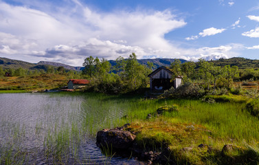 Boathouses by the mountain lake