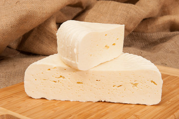 cheese on a wooden board