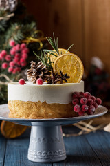 Double cheesecake with berries on a dark background