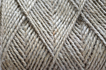 Top view of natural jute twine skein background, macro
