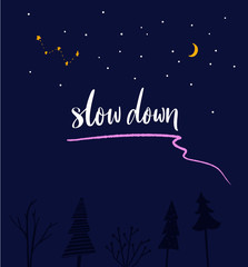 Naklejka premium Slow down. Inspirational quote, handwritten calligraphy on night sky with forest for diary, journal or poster design. Slow life slogan.