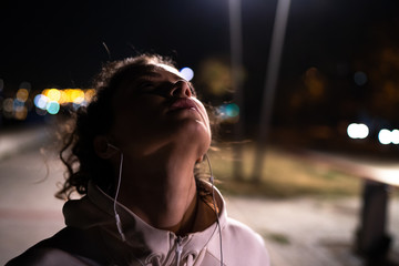 Woman getting ready for a night run