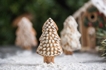 Gingerbread christmas tree on the backgroun of other christmas tree