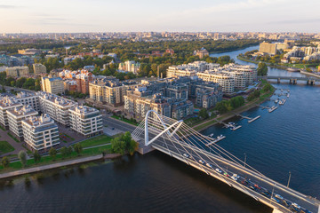 Obraz premium Lazarevsky Bridge in St. Petersburg. Cable-stayed Lazarevsky Bridge in Sant Petersburg a sunset, Russia