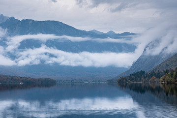 Beautiful view of misty mountain Bohinj lake in the morning