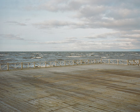 Spacious veranda on coastline in wind