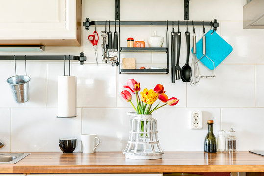 Kitchen counter with appliances and beautiful tulips
