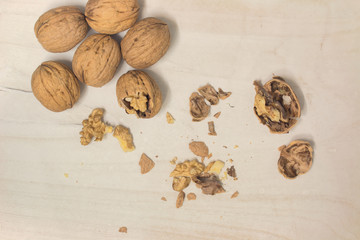 cracked nut isolated on a wood background