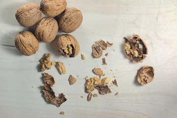cracked nut isolated on a wood background