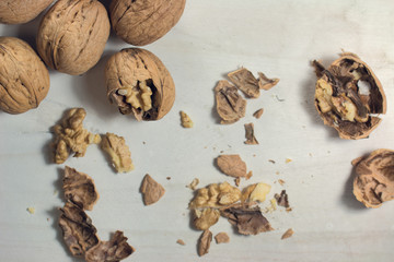 cracked nut isolated on a wood background