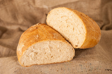 white bread on burlap background