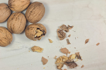 cracked nut isolated on a wood background