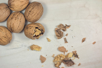 cracked nut isolated on a wood background