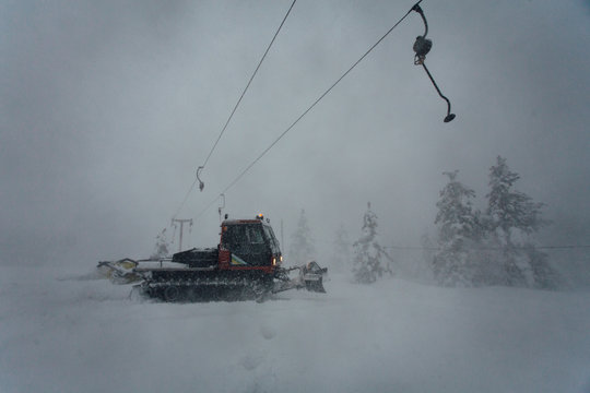 Ski ratrak on heavy snow