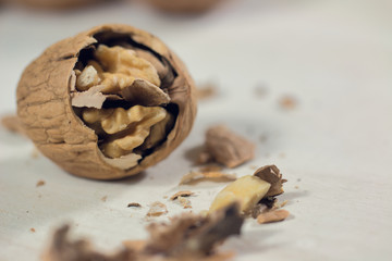 cracked nut isolated on a wood background