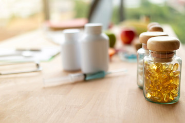 Medicine bottle or vitamin bottle on the doctor's desk