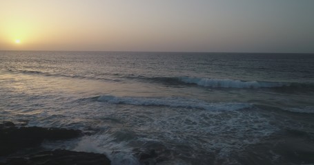 landscape and sunset on the Atlantic coast watching the breaking of the waves