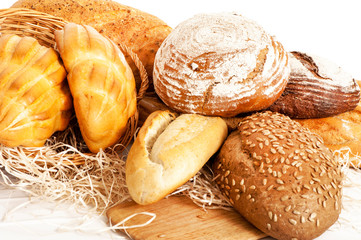 Several types of bread on white background