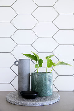 Close up of kitchen vignettes with white tile background
