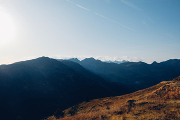 Beautiful alpine landscape with mountain silhouettes in the Col de la Lombarde or Colle della Lombarda during the sunset.