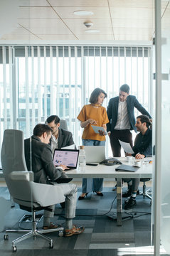 Businesspeople Working at Meeting Room