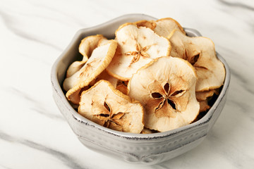Fototapeta premium Bowl of Healthy Snack from fruit Chips, dried apple
