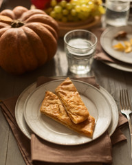 Pumpkin pie on a festive autumn table