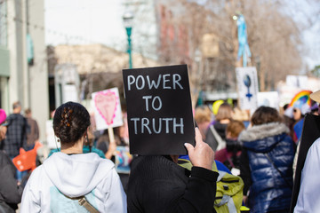 Protest sign reading : ""power to truth""