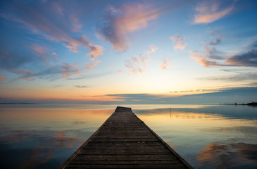 Naklejka na ściany i meble wooden pier in the sunset