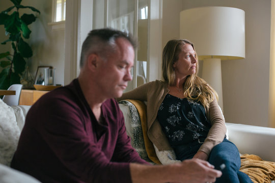 Marriage partners having a difficult conversation at home