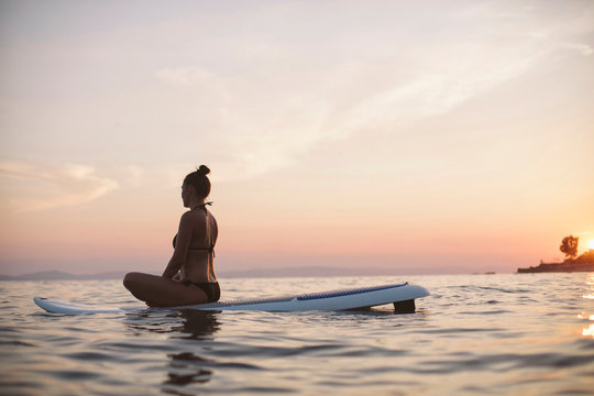 Woman On A Stand-Up Paddle