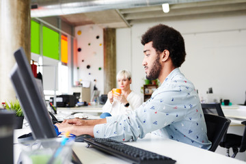 Diverse people working in office