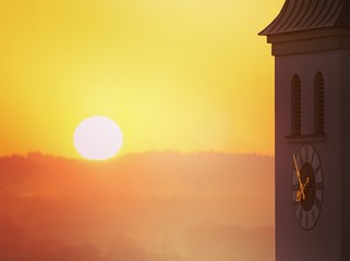 Clock at sunrise