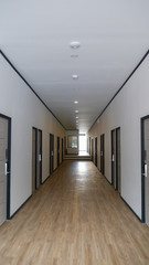 hotel hallway with many doors