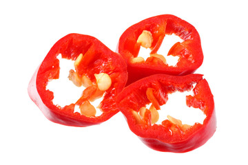 red hot chili peppers slices isolated on white background. top view