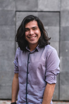 Smiling brunette young mexican guy