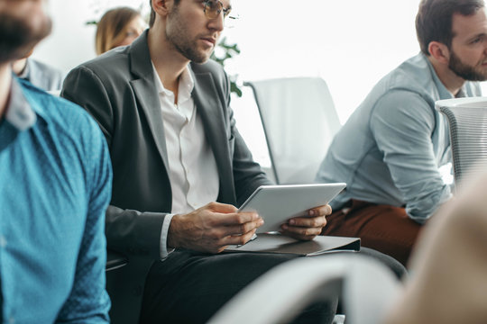 Businesspeople Attending Business Conference