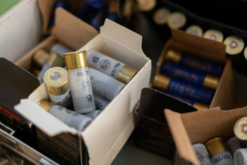 some boxes storage with hunting bullets ammunition for animal rifle - obrazy, fototapety, plakaty