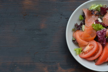A fresh and healthy salmon salad with tomatoes
