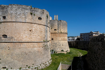Fototapeta na wymiar Otranto, APULIA, Italy. The Aragonese castle is the defensive stronghold city of Otranto. A historical defense tower as part of the city wall of Otranto in Italy.