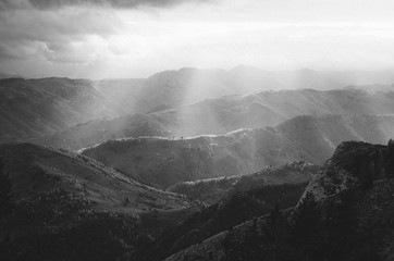 Sun rays over mountain landscape