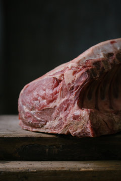 Piece of pork meat on board
