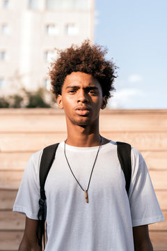 Portrait of handsome afro man looking at camera